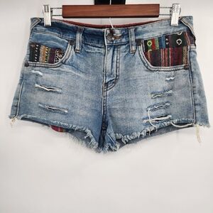 Free People Distressed Shorts with Baja Blanket Accents